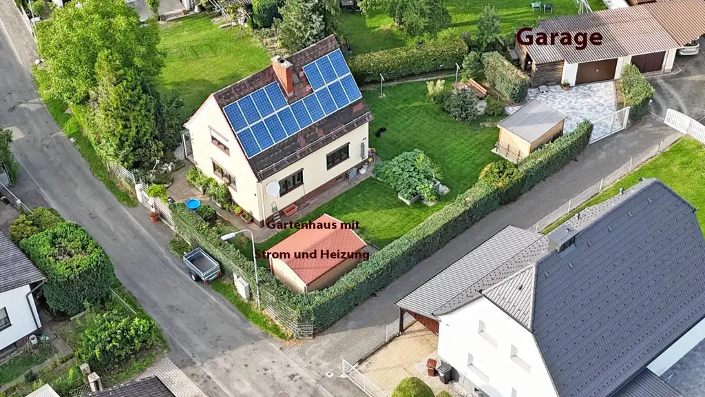 Einfamilienhaus mit Garage,mit winterfestem Gartenhaus, Werkstätte u.a