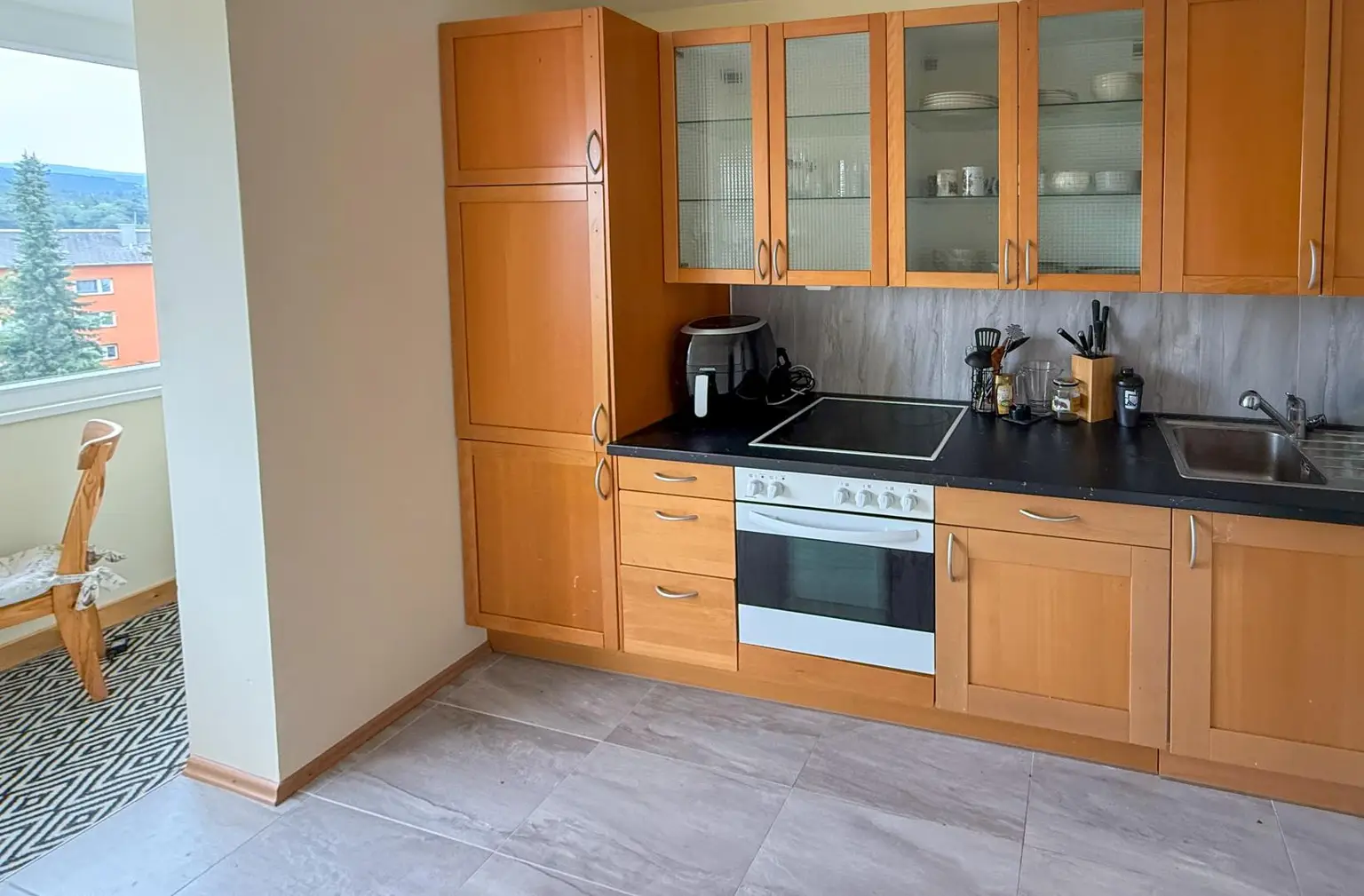 Traumhafte 2-Zimmer-Wohnung mit Penthouse-Flair und Weitblick durch den Wintergarten