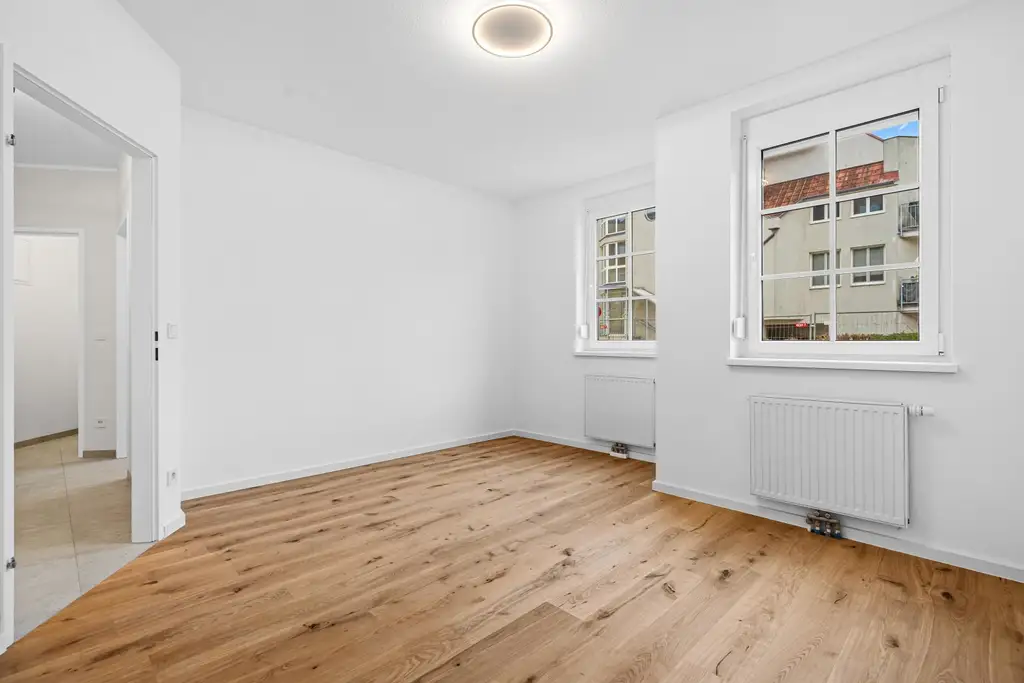 "Helle, Top-renovierte Eigentumswohnung mit Balkon & Garagenplatz – ruhig wohnen, zentral leben"