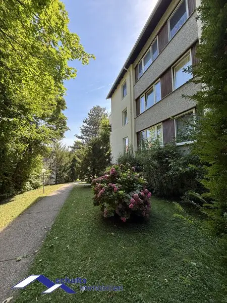 SCHULTZ IMMOBILIEN - Charmante 2-Zimmer-Wohnung in Baden! Ruhelage!  Balkon und Garage!