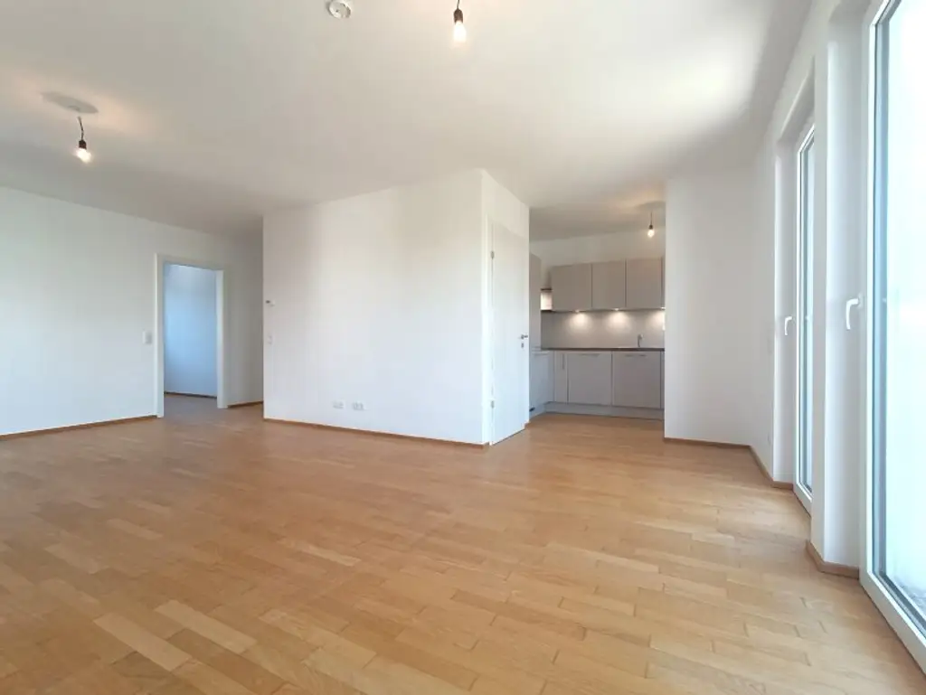 Neubau! Siedlung Rustenfeld! 4-Zimmer Wohnung mit traumhaftem Ausblick auf rund 103 m² mit Balkon!