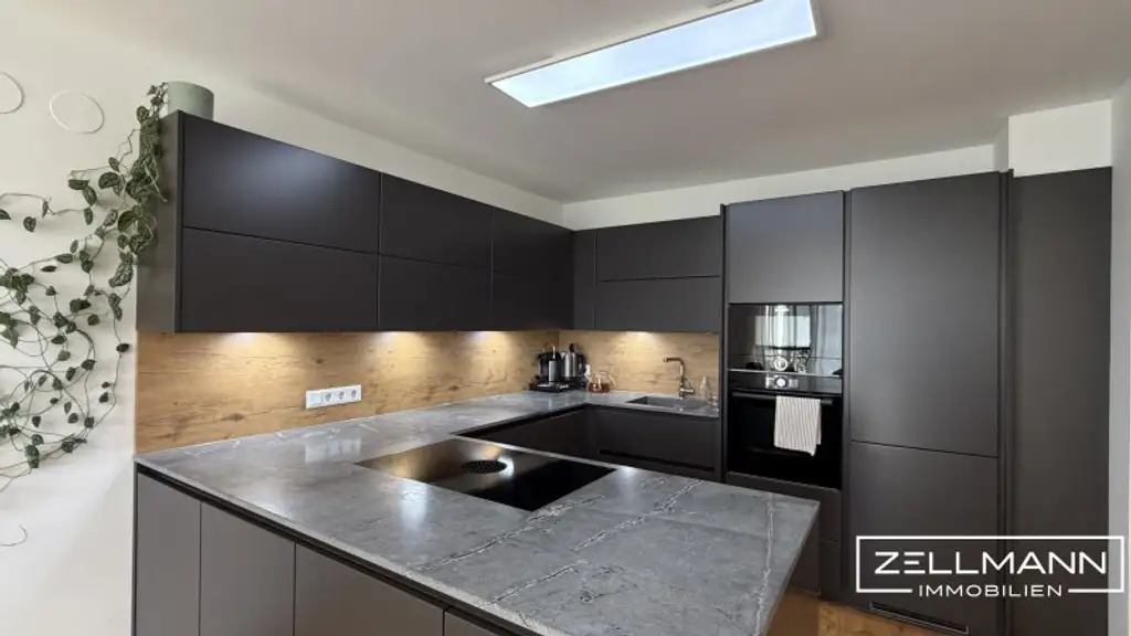 „Modernes Wohnerlebnis mit Stil – Gartenwohnung mit außergewöhnlicher Küche und luxuriösem Bad“ | ZELLMANN IMMOBILIEN