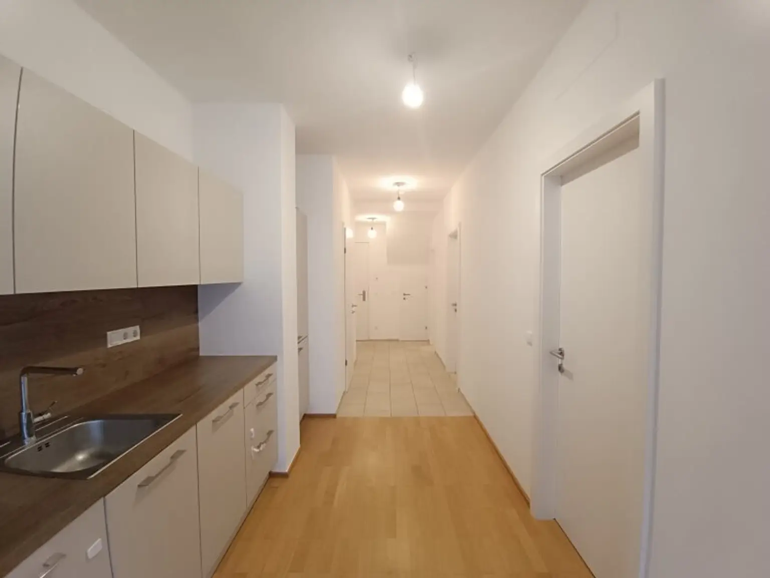 Neubau! Siedlung Rustenfeld! 2-Zimmer Wohnung im DG mit Dachterrasse! ! Stellplatz in Tiefgarage optional verfügbar!