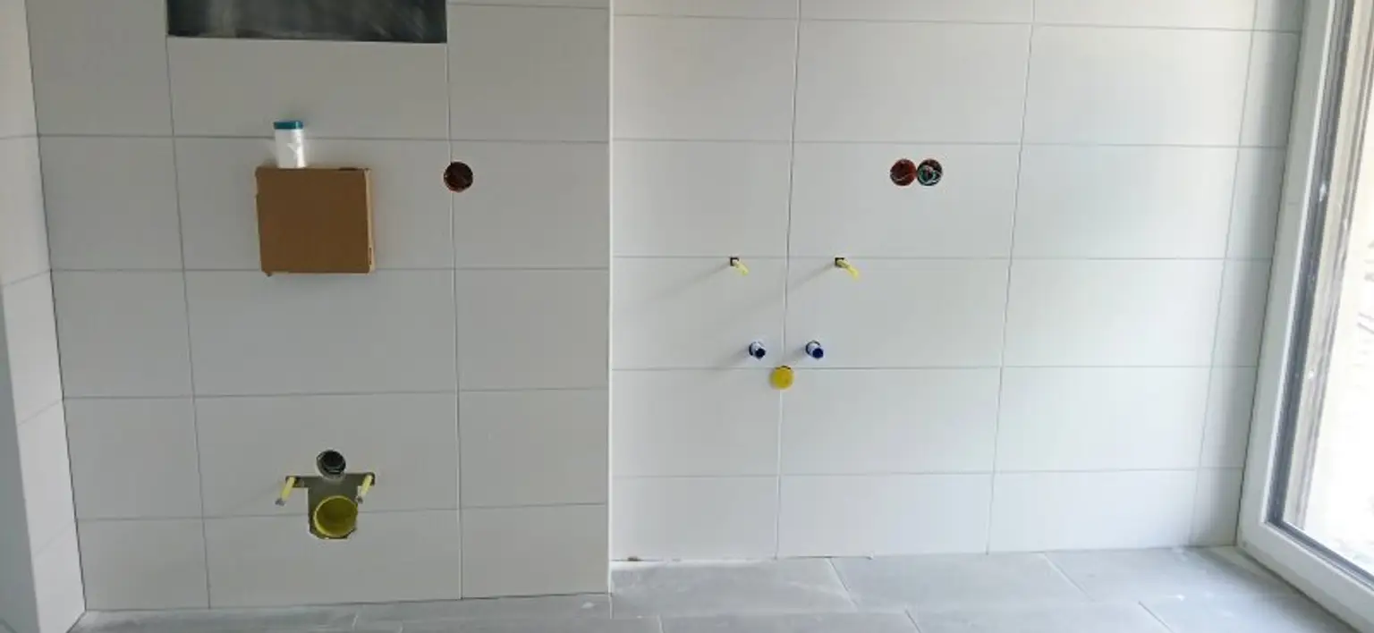 NEUBAU - ERSTBEZUG - Top 2 - Wunderschöne 2 Zimmerwohnung mit Terrasse, kleinem Garten und einem eigenen Tiefgaragenplatz