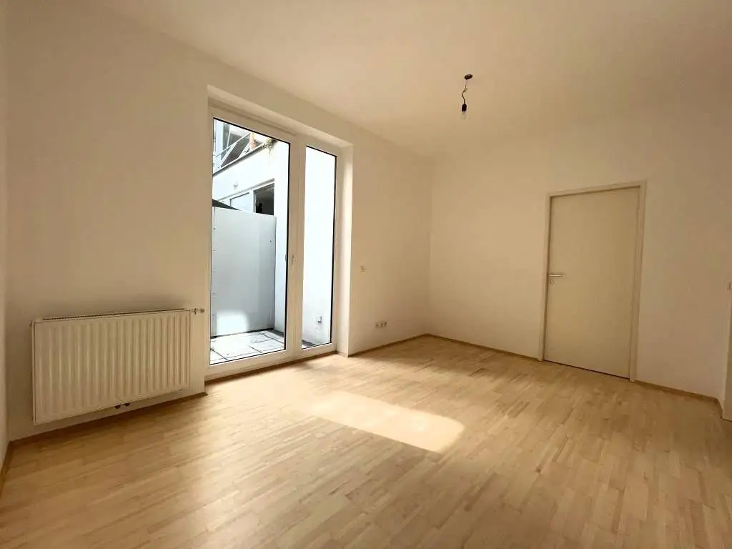 Erdgeschoß, barrierefrei, Innenhof! Ruhige, loft-artige Neubauwohnung mit 2 kl. Terrassen