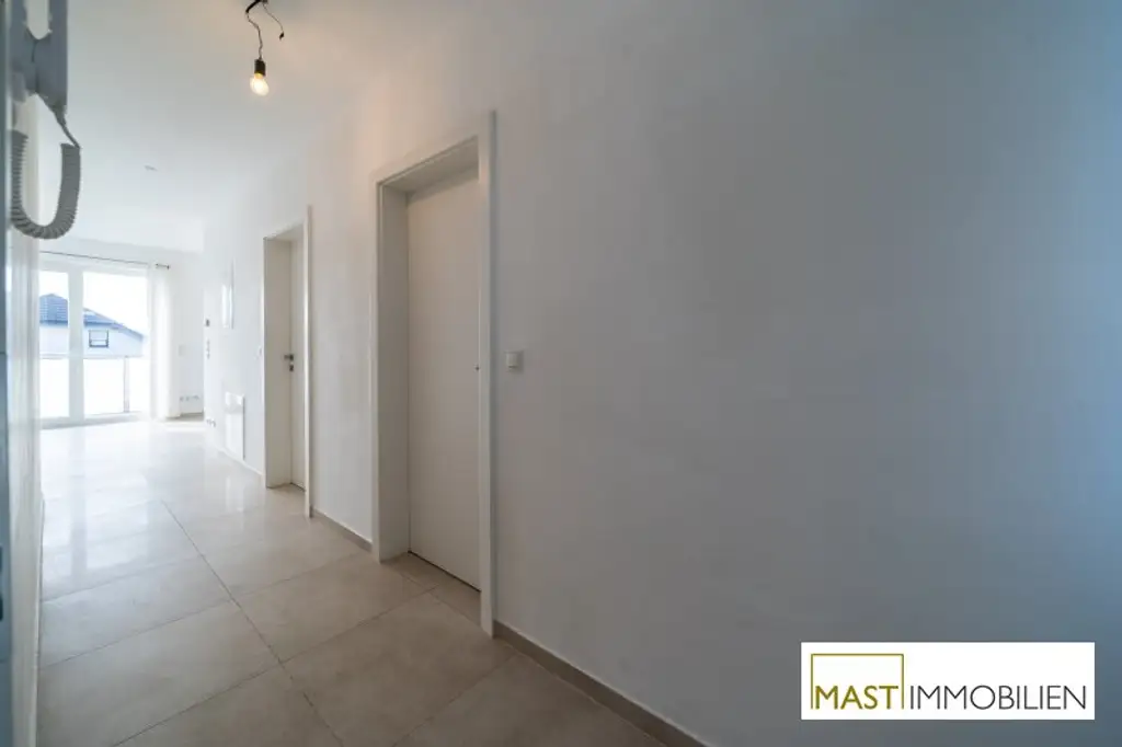 direkt im Herzen von Strasshof: moderne Wohnung mit Balkon und hochwertiger Ausstattung *sofort bezugsbereit
