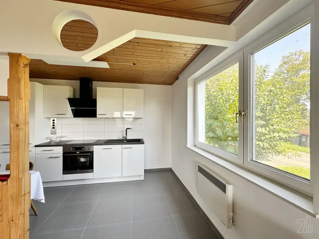 Charmanter Bungalow auf großzügigem Grundstück mit Seeblick