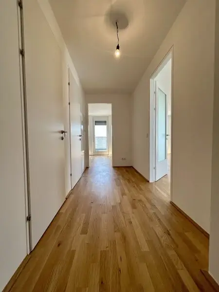 Traumhafte Dachgeschosswohnung in 1230 Wien – Erstbezug mit Balkon und Terrassen!