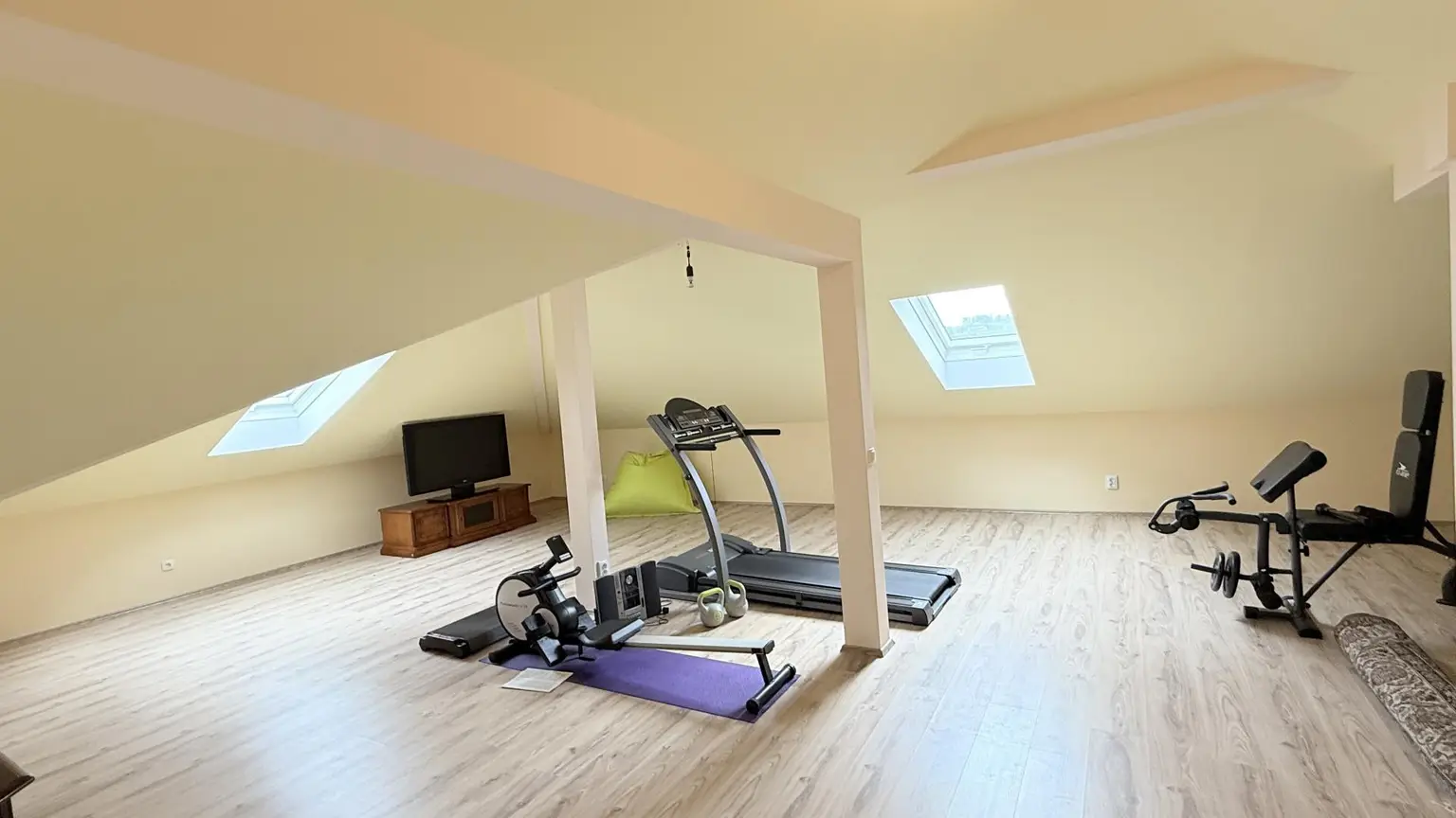 Fitnessraum über der Garage