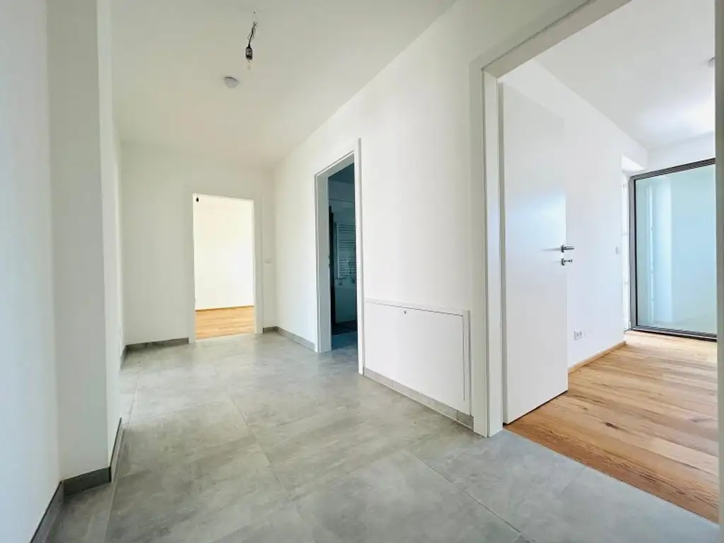 PROVISIONSFREI! Traumhafte Wohnung im DG - 2 Terrassen - Fitnessraum - PKW Stellplatz - Erstbezug nähe Donau