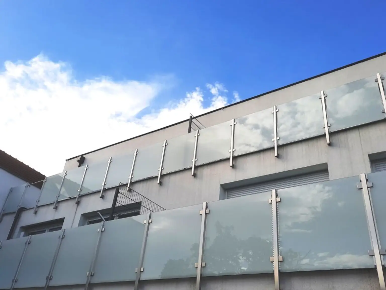 Anlegerpaket in Baden: 2 Wohnungen, 2 Stadthäuser und 4 Stellplätze