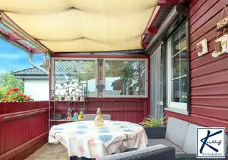 überdachte Hochterrasse