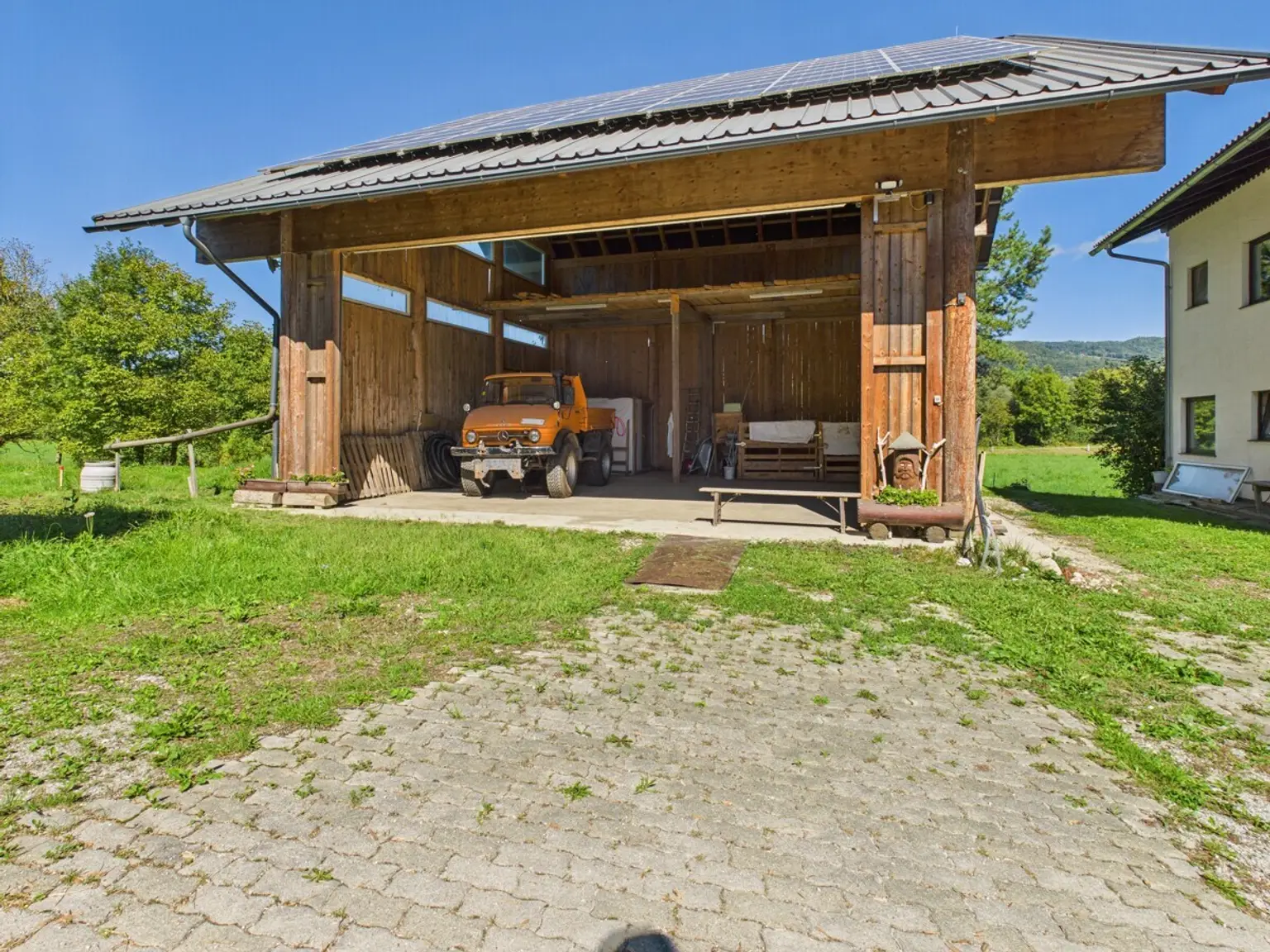 Energieautarkes Leben im Rosental – Bauland, Wohnhaus, Nebengebäude, Hackschnitzelheizung, Fernwärme