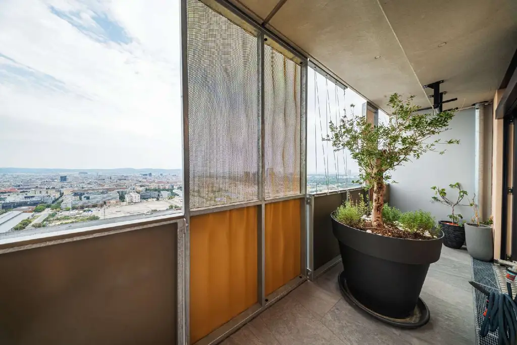Penthouse im 34. OG mit Terrasse I 360° Wienblick I Designküche I TG Platz mit E-Ladestation