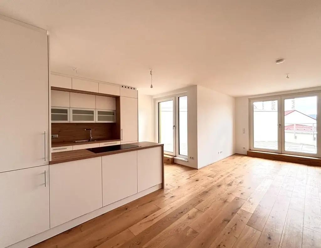 Wunderschöner Erstbezug! Lichtdurchflutete 4-Zimmer-Dachgeschoßwohnung | Tischlerküche | Zwei Bäder | Klimaanlage | Terrasse mit Weitblick und Privatsphäre | Tiefgarage