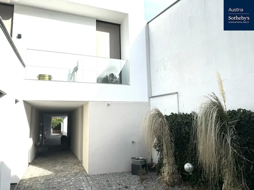 Privatsphäre & Perfektion – Architektenvilla mit Garten, drei Terrassen & Homeoffice