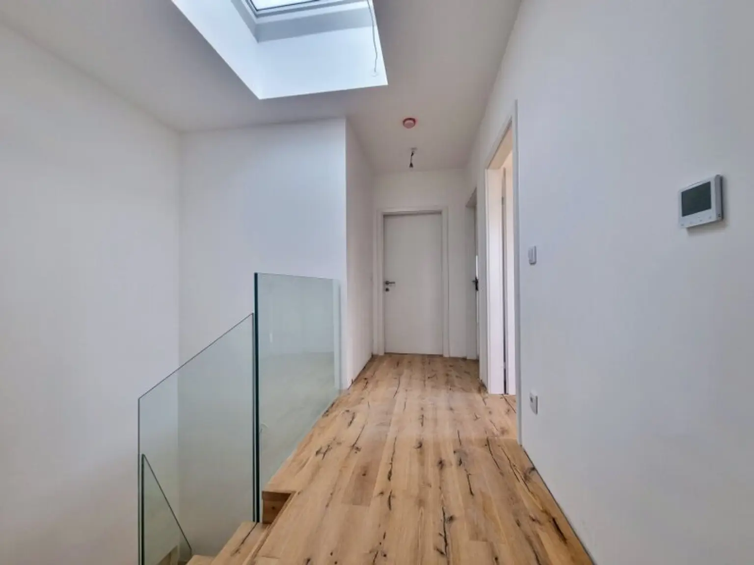 Neubau-Erstbezug: Flexible EG-Gewerbefläche für Praxis, Büro oder Ordination am Rosenhügel