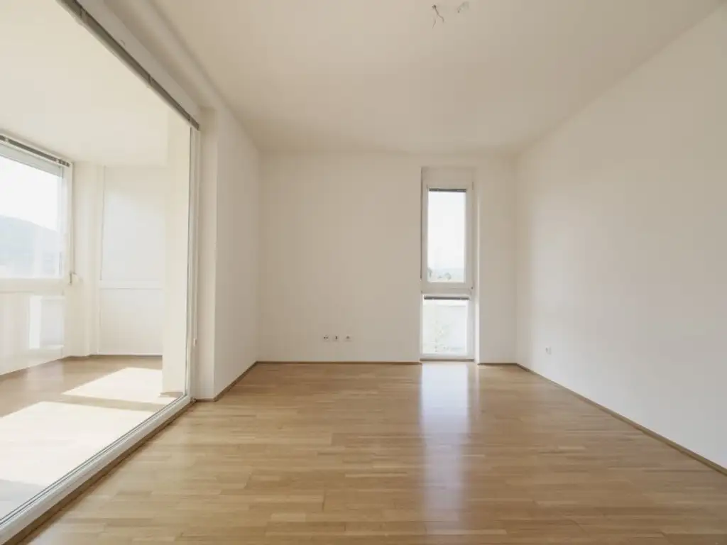 Exklusive Dachgeschoss-Maisonette mit supergroßer Terrasse und wunderbarem Fernblick & Tiefgaragenparkplatz