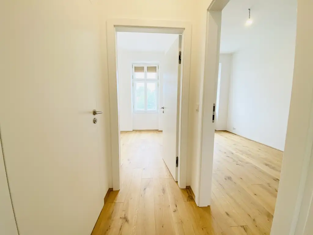 Exklusiver Erstbezug nach Sanierung - 3-Zimmerwohnung mit Freifläche in den ruhigen Innenhof