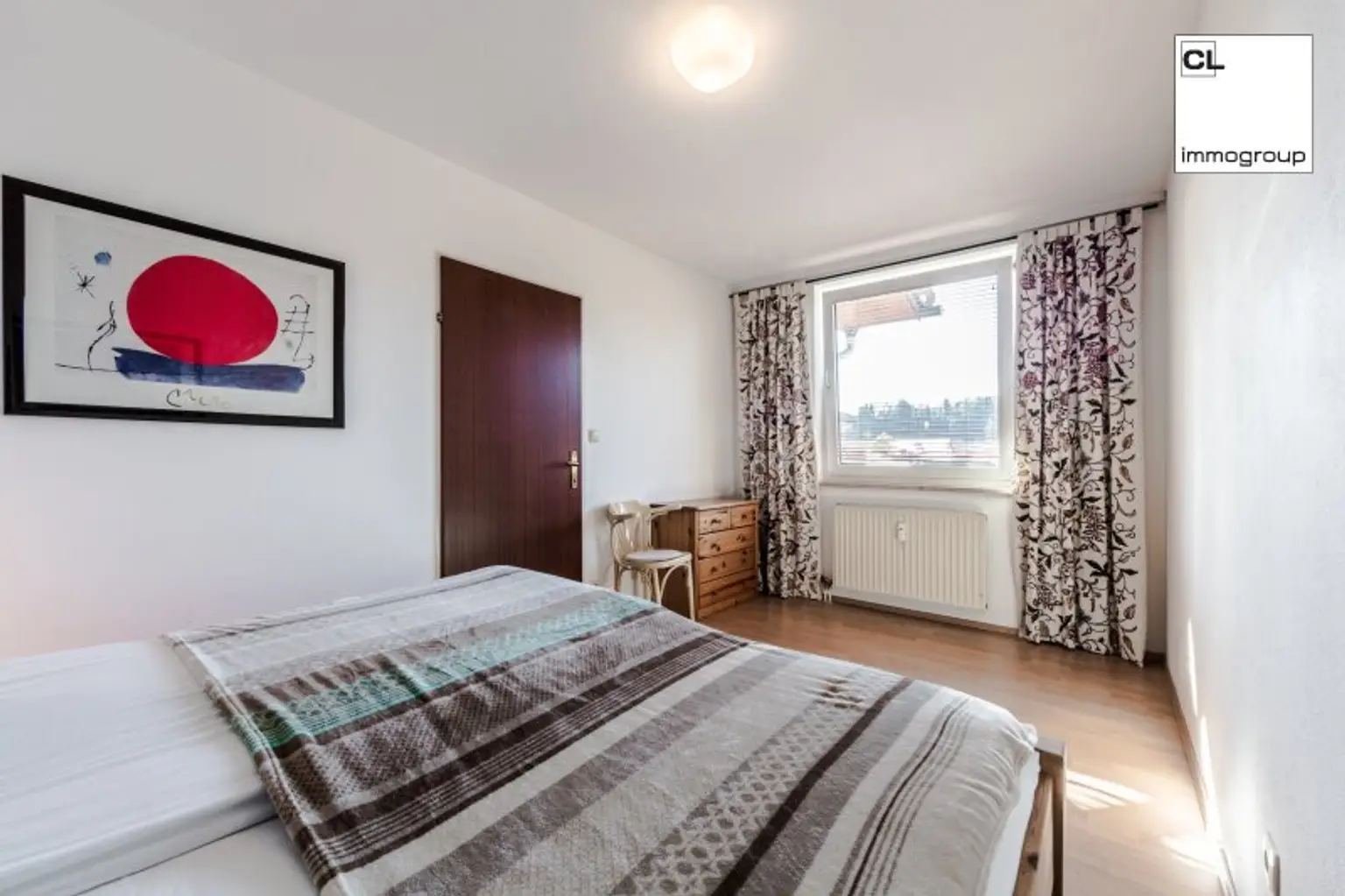 Gemütliches Schlafzimmer im hinteren Teil der Mietwohnung