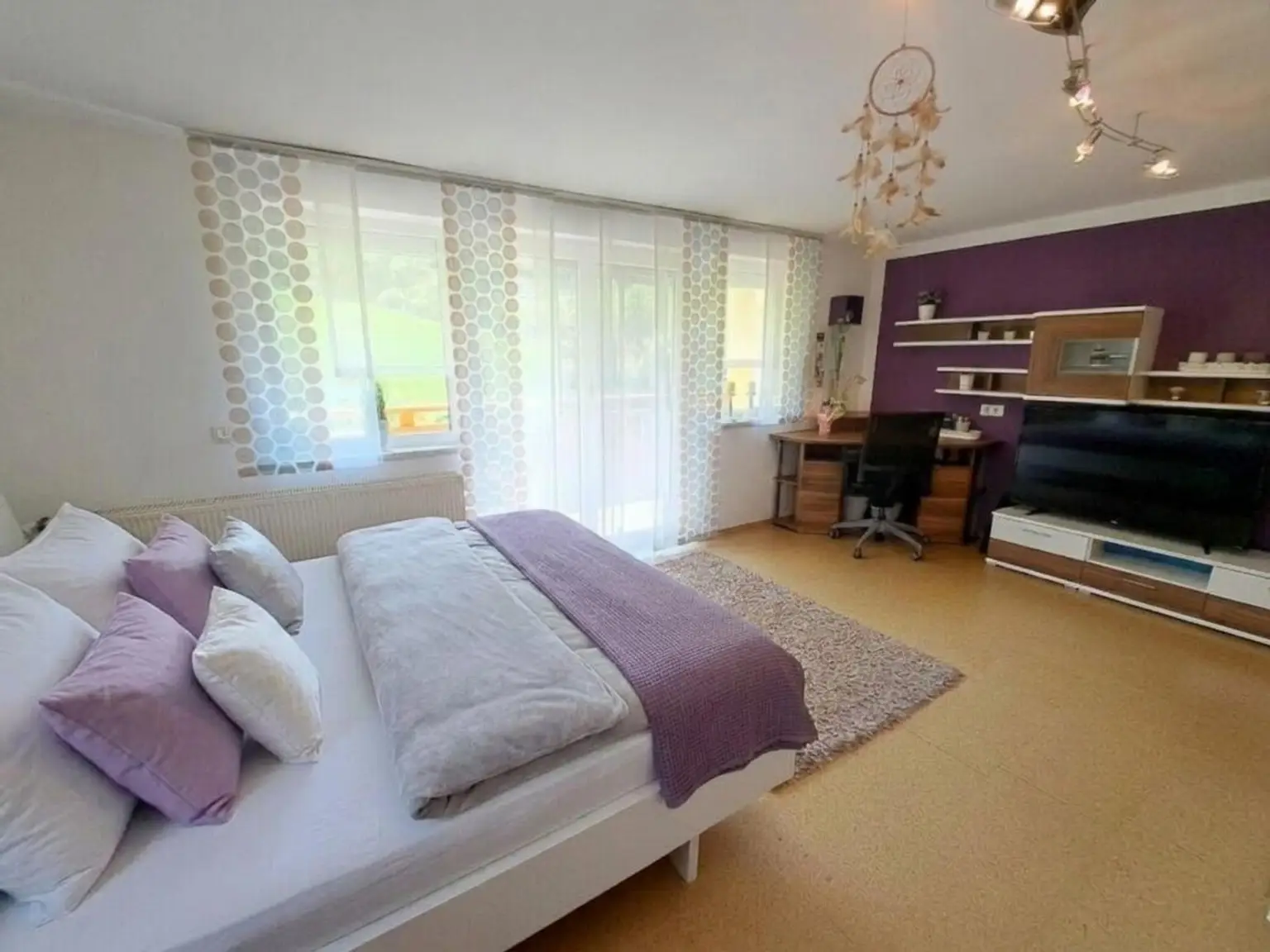 Garconniere - Wohnzimmer mit Balkon