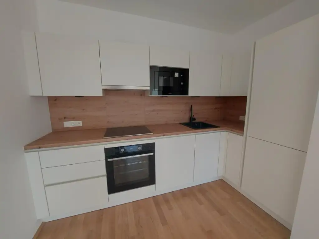 3-Zimmer-Erdgeschoßwohnung mit Terrasse und Tiefgaragenstellplatz (Top 02)