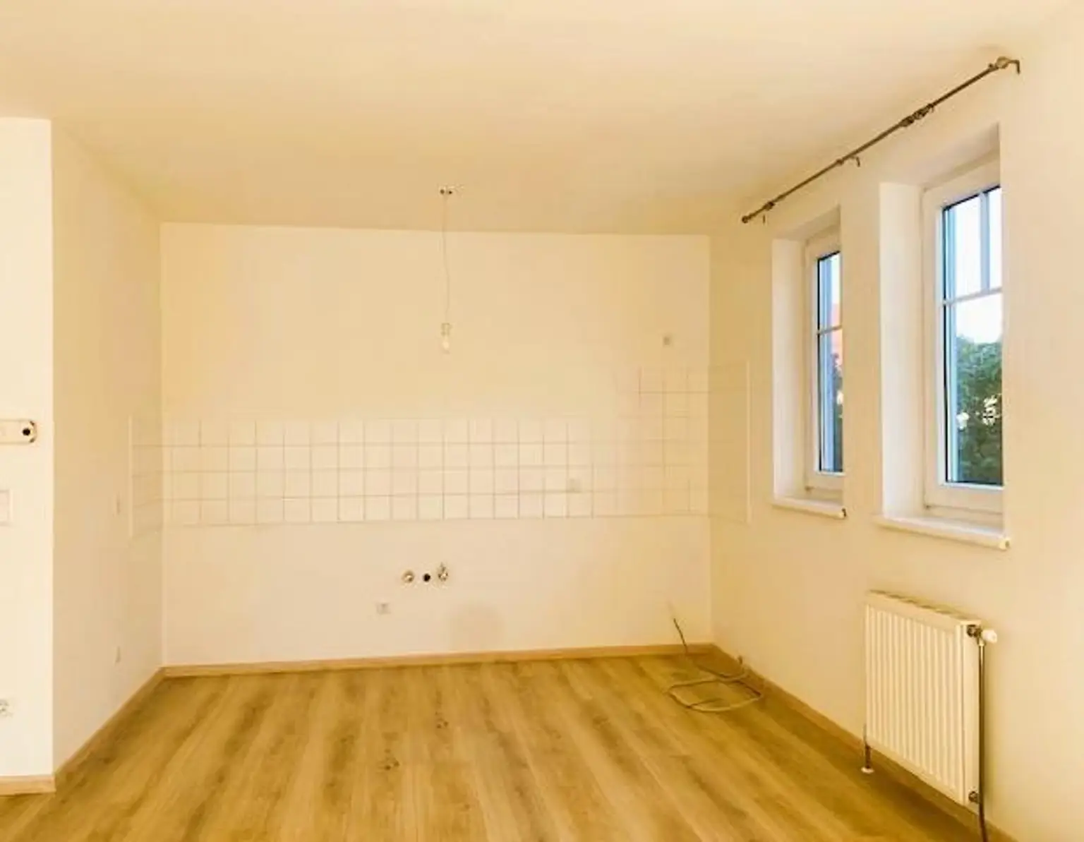 Grüne Oase in Kliniknähe – Erdgeschosswohnung wie neu, mit Carport & Garten!