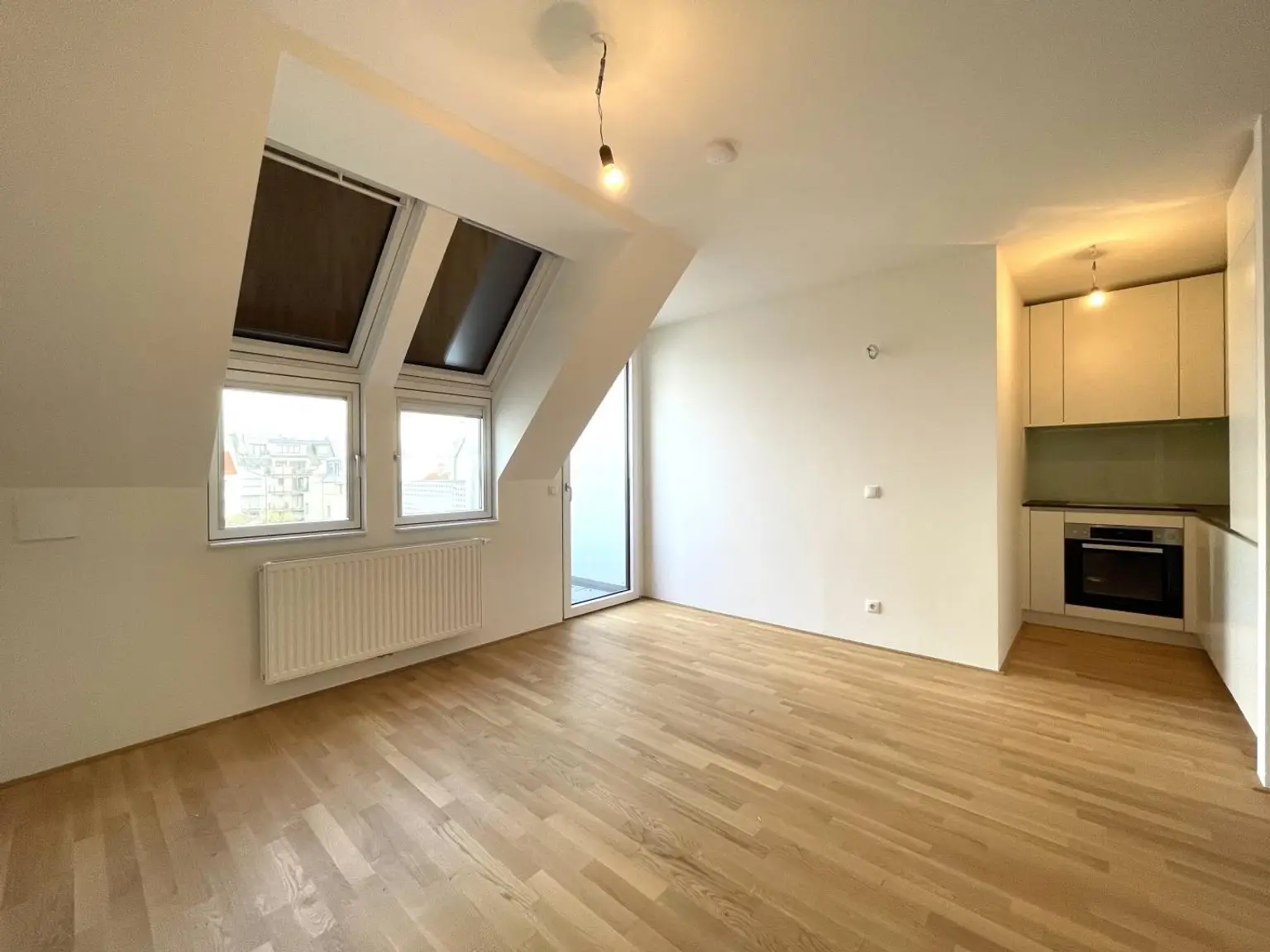 Klimatisierte Neubauwohnung mit hofseitigem Balkon im Dachgeschoss!!!