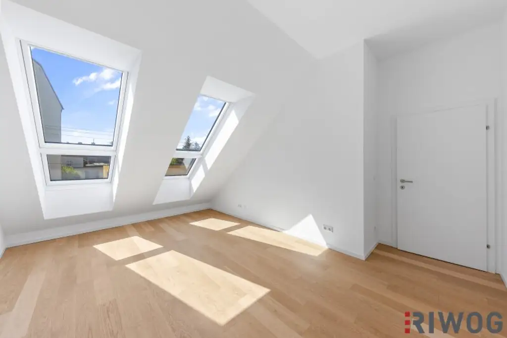 Imposante und sehr helle Dachgeschosswohnung mit 2 Terrassen und hochwertiger Ausstattung in ehemlaigen Fuhrwerkhaus