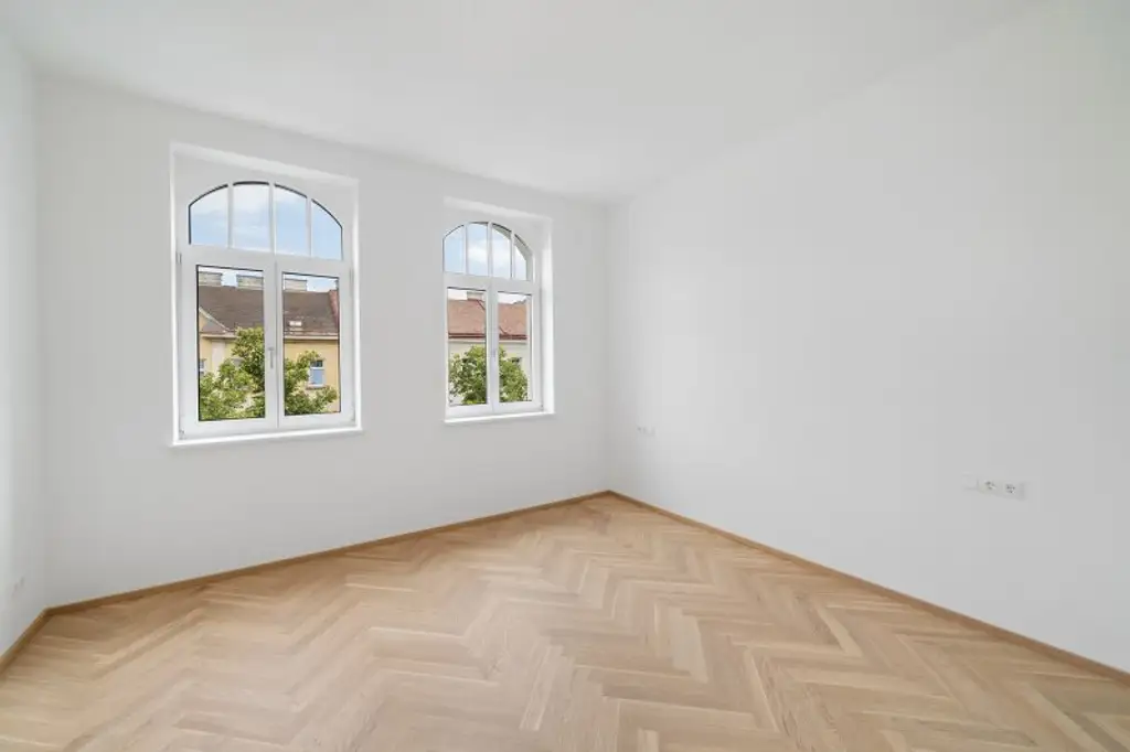 4-Zimmer-Altbaueigentumswohnung in generalsaniertem Altbau mit Balkon