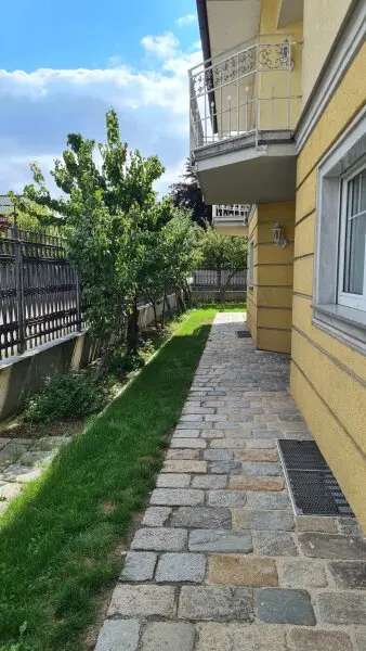 Sehr ruhige Siedlungslage - Gartenwohnung mit Garage in sehr gepflegten Haus