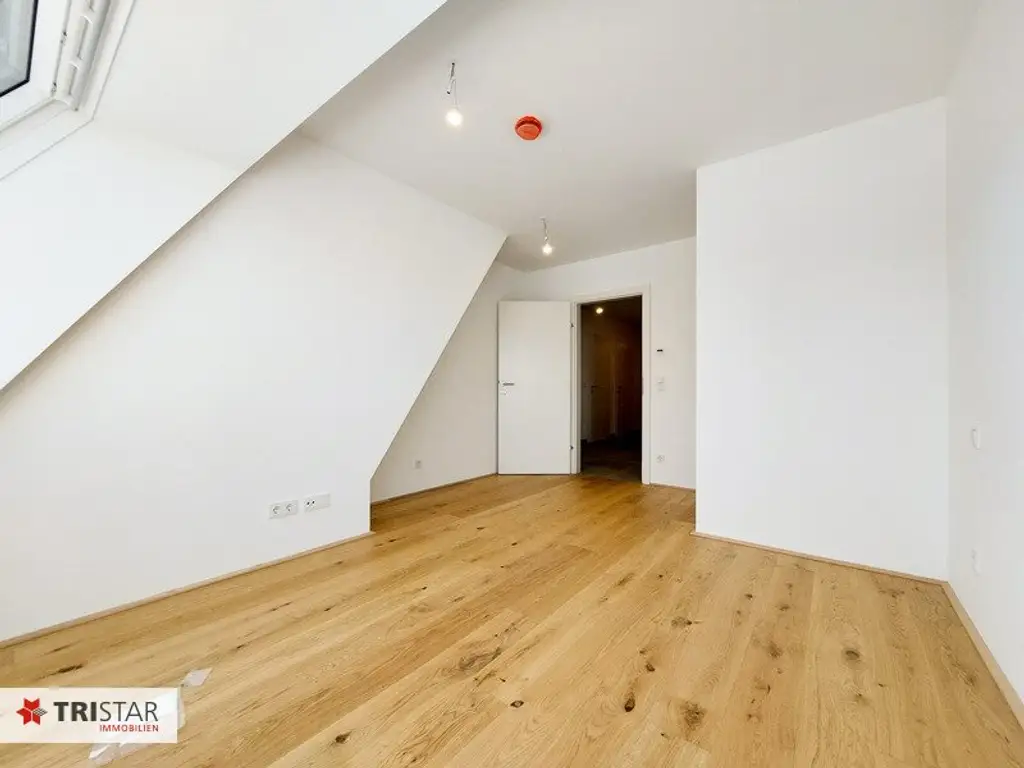 Moderne Dachgeschoßwohnung in 1220 Wien – Erstbezug mit Balkon und Fußbodenheizung!
