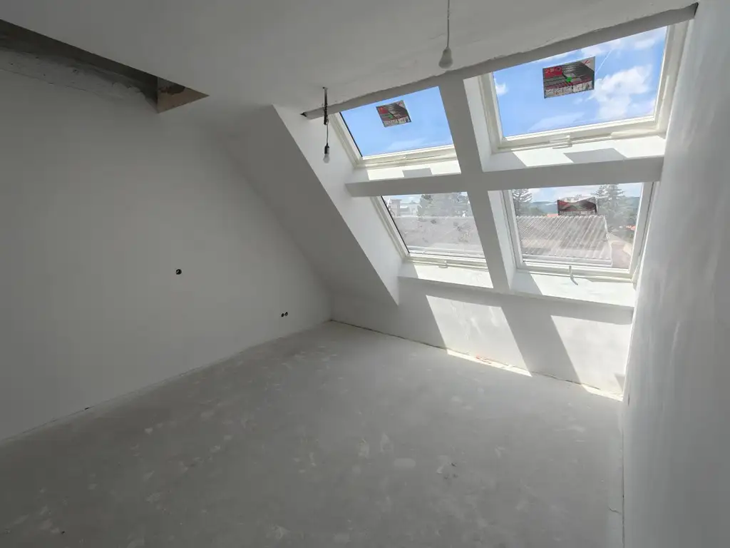 Stilvolle 2-Zimmer-Dachgeschosswohnung mit großer Dachterrasse & zusätzlichem Dachraum