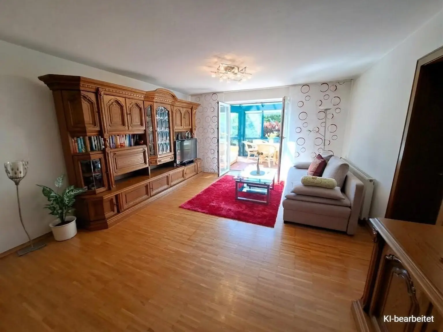 OG-Wohnung - Wohnzimmer mit Wintergarten.2
