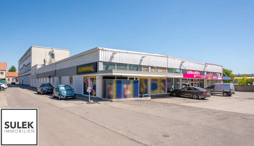 Grundstück mit vier Baukörpern - Büro-, Geschäfts- und Gewerbegebäude inkl. Parkplätzen in Vösendorf