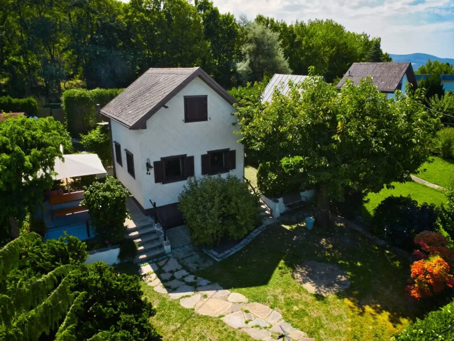 Seltenes Kleingarten-Eigentum am Wolfersberg – Haus mit Ausbaupotenzial, Terrasse & herrlicher Blick ins Grüne
