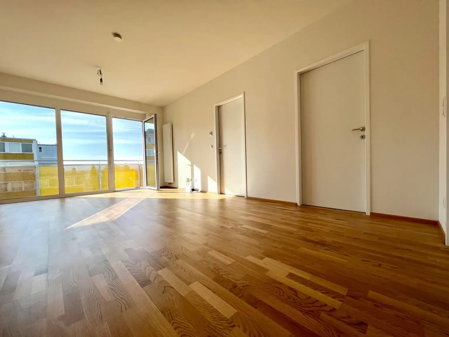 Wohnzimmer4 | ++ NEUBAUWOHNUNG in TULLN ++ ZWEI Zimmer mit BALKON | Prima Service Immobilien