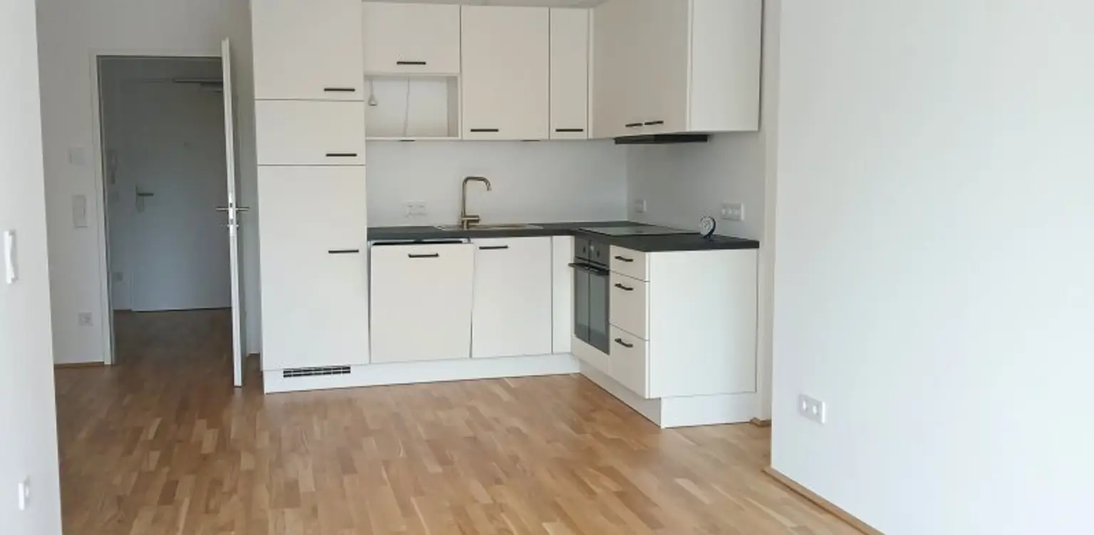 NEUBAU - ERSTBEZUG - Top 18 - Wunderschöne 2 Zimmerwohnung mit großem Balkon und eigenem Tiefgaragenplatz
