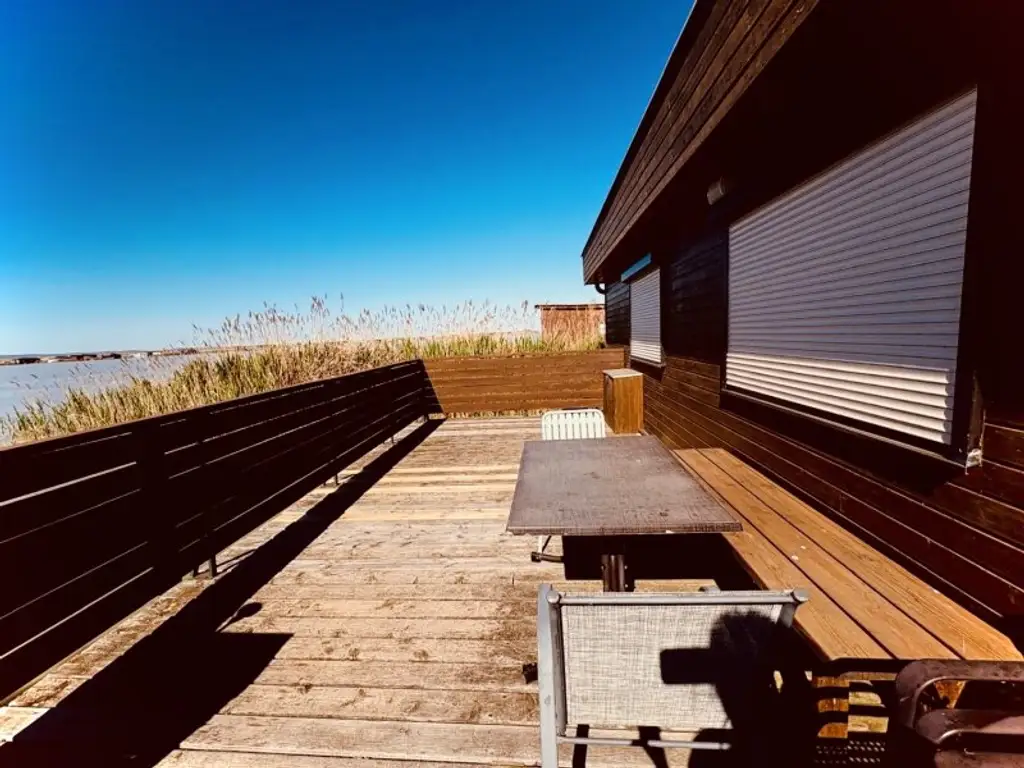 PRIVATSPHÄRE und FLIESSWASSER - FLACHDACHHÜTTE IN DER RUSTER BUCHT AUF PACHTGRUND ZU KAUFEN