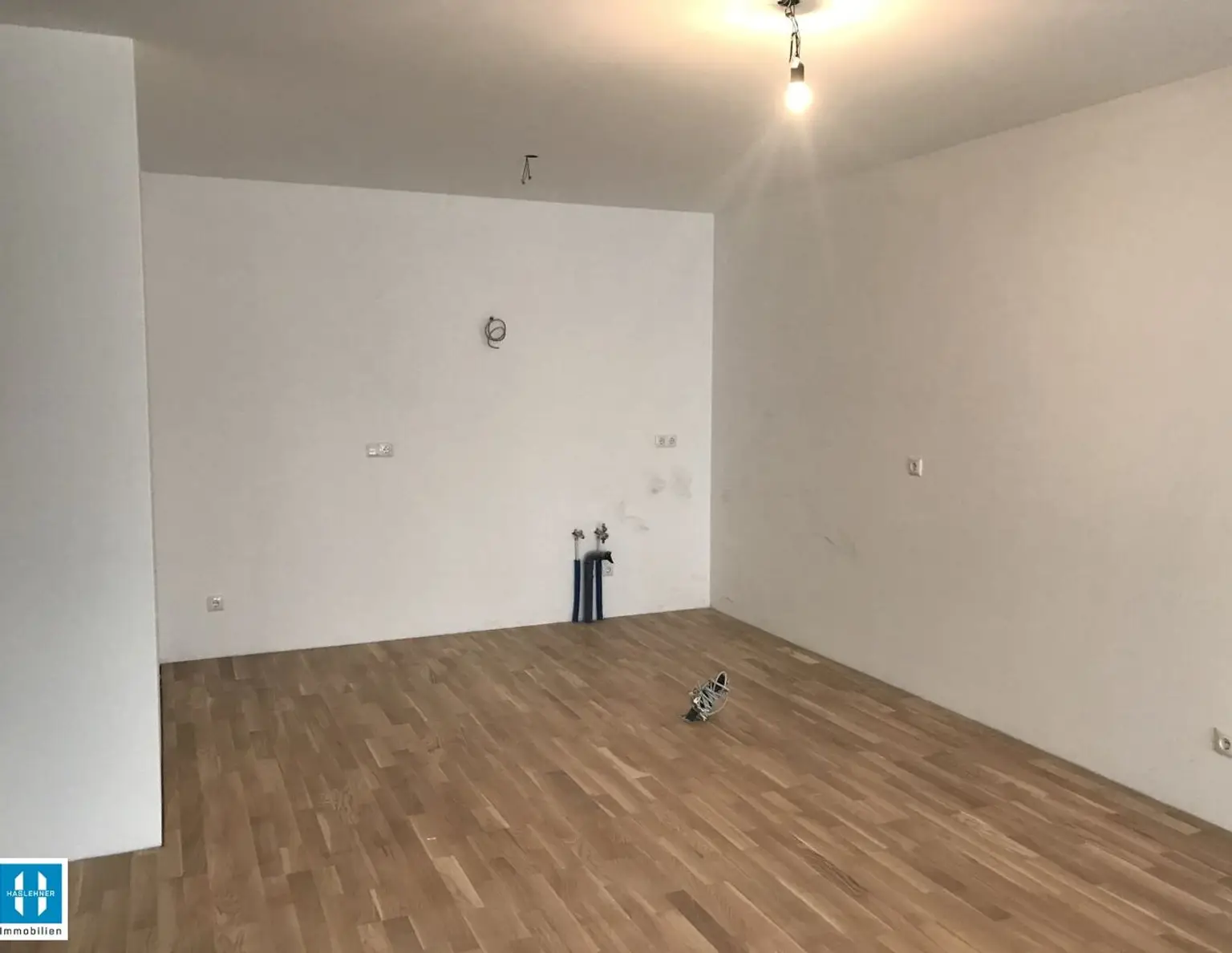 vermietete Anlegerwohnung beim Projekt RIED² - Top B9 - gemütliche 53,34m² Wohnung mit Balkon und TG Parkplatz