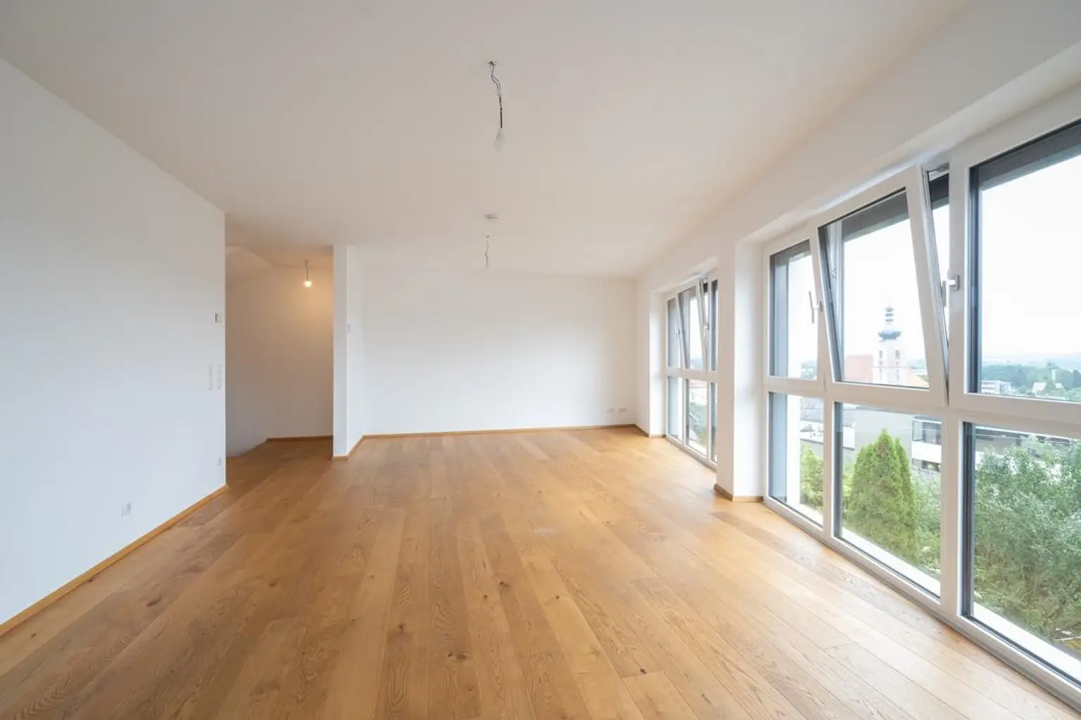 Exklusives Wohnen über drei Etagen mit traumhafter Dachterrasse und PANORAMABLICK im Zentrum von Sierning!