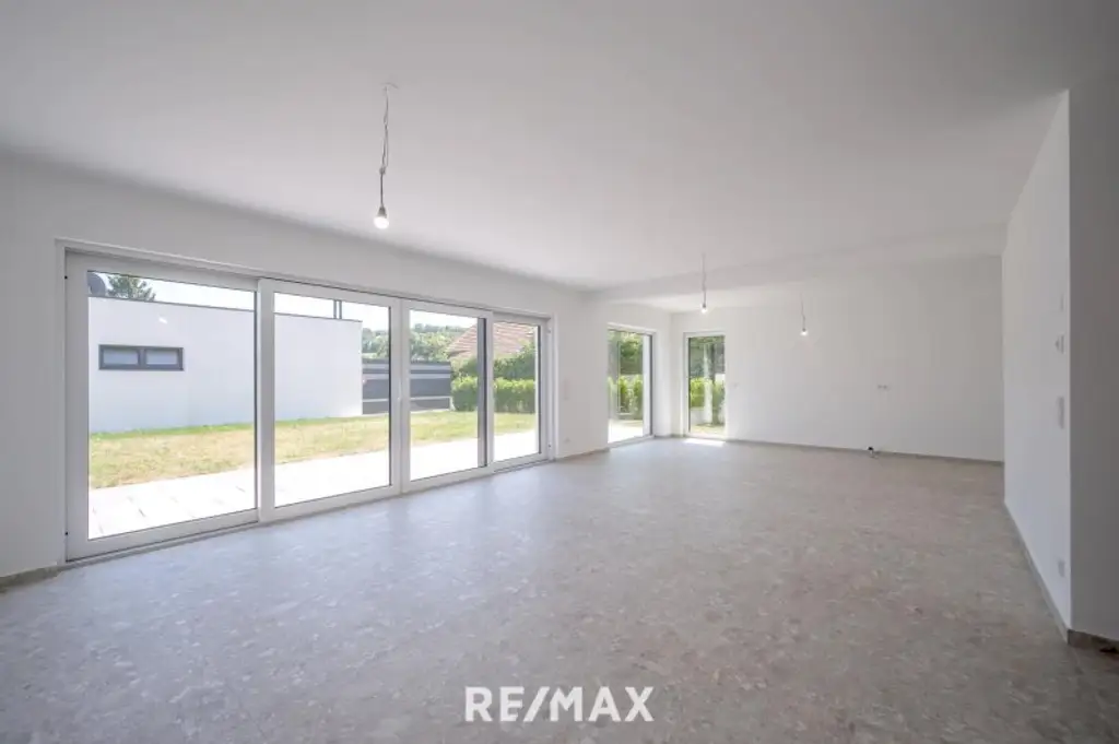 Erstbezug: Großzügiger Familientraum mit unverbaubarem Grünblick!