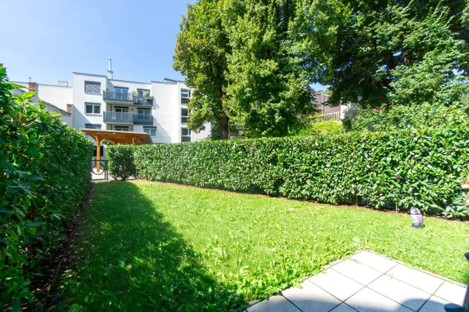 Entzückende 2-Zimmer-Wohnung mit 70 m² Garten in bester Penzinger Lage