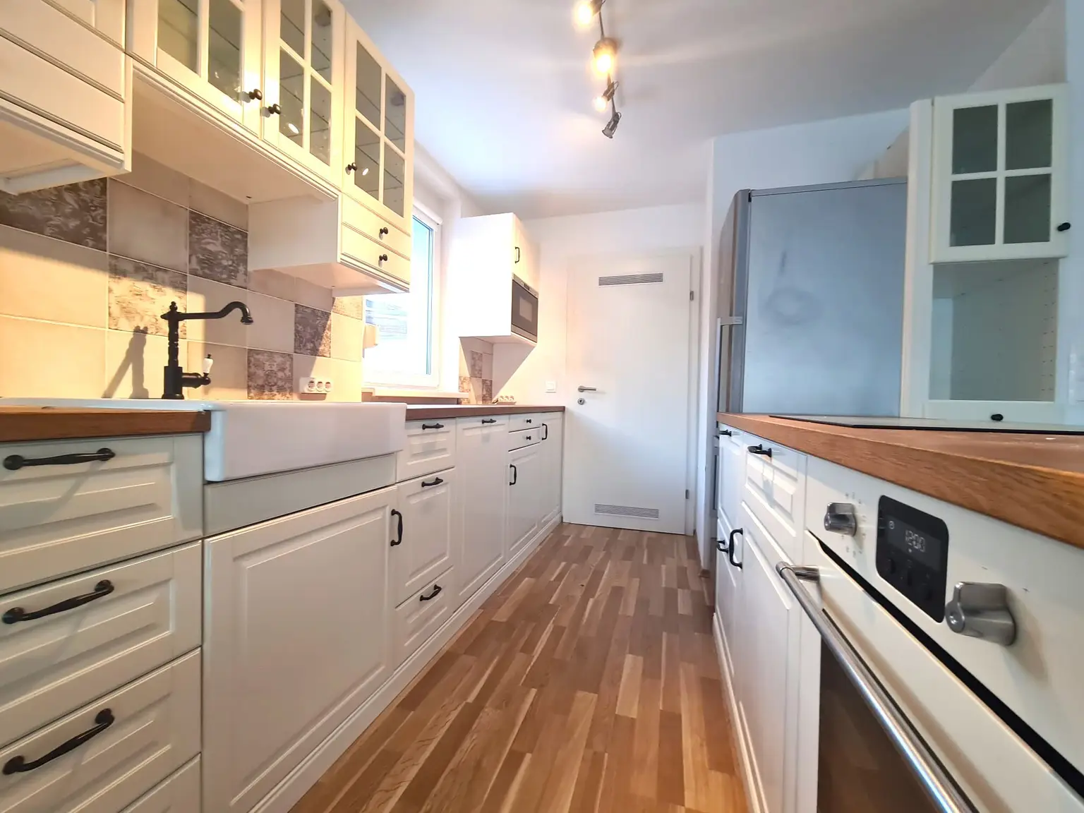 Wundeschöne Maisonettenwohnung mit Dachterrasse, Garten und Carport!