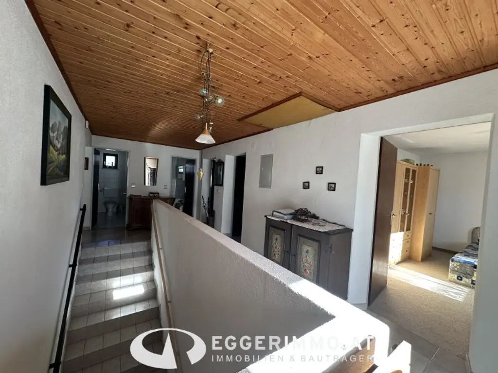Niedernsill - Spacious 4-Room Apartment with Garden & Balcony for Sale in a Two-Party House