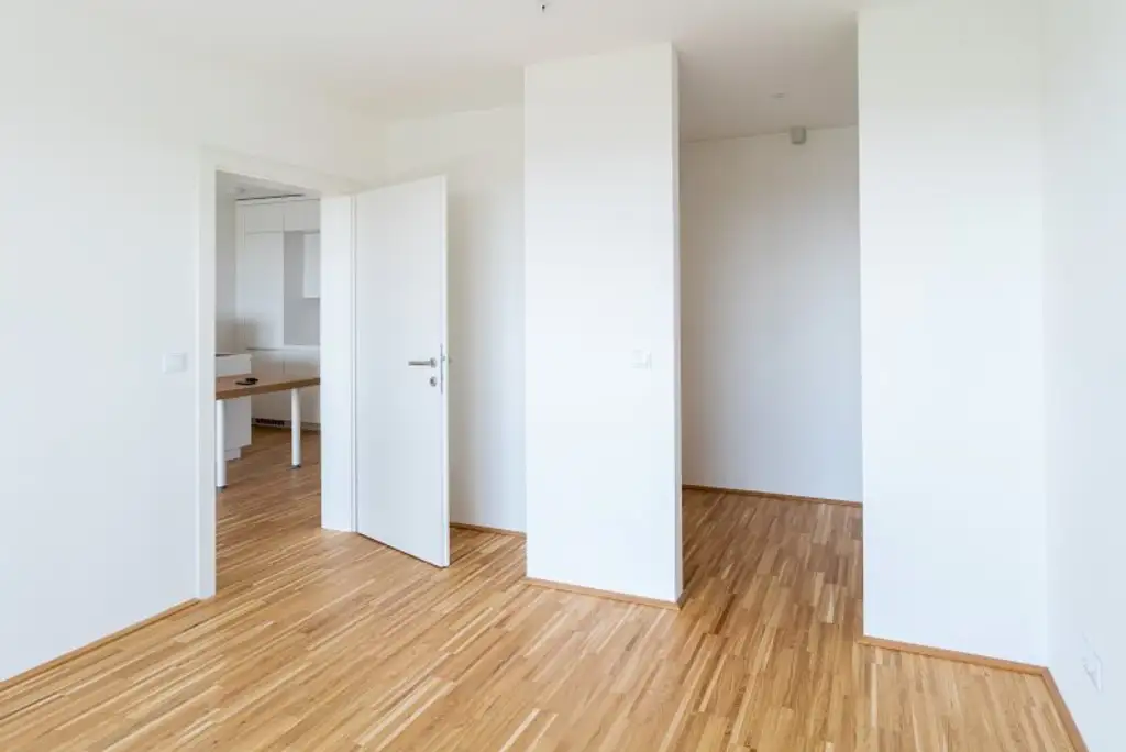 TABA Tower - Serviciertes Apartment mit grandiosem Fernblick direkt an der U1 Oberlaa - begehbarer Kleiderschrank, inkl. Heizung, Kühlung, Strom, Internet und Fitnessraum!