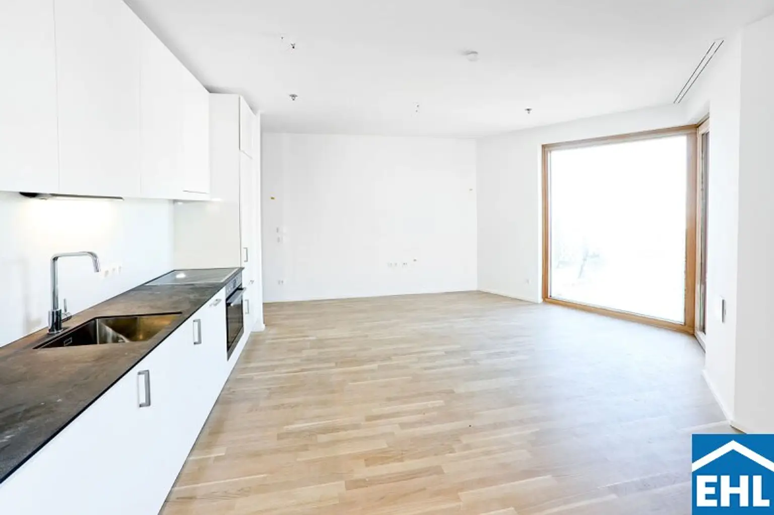 Sonnwendviertel: 1-Zimmer-Wohnung mit Balkon im 18. OG – Fitnessraum, Co-Working & Rooftop-Terrasse inklusive!