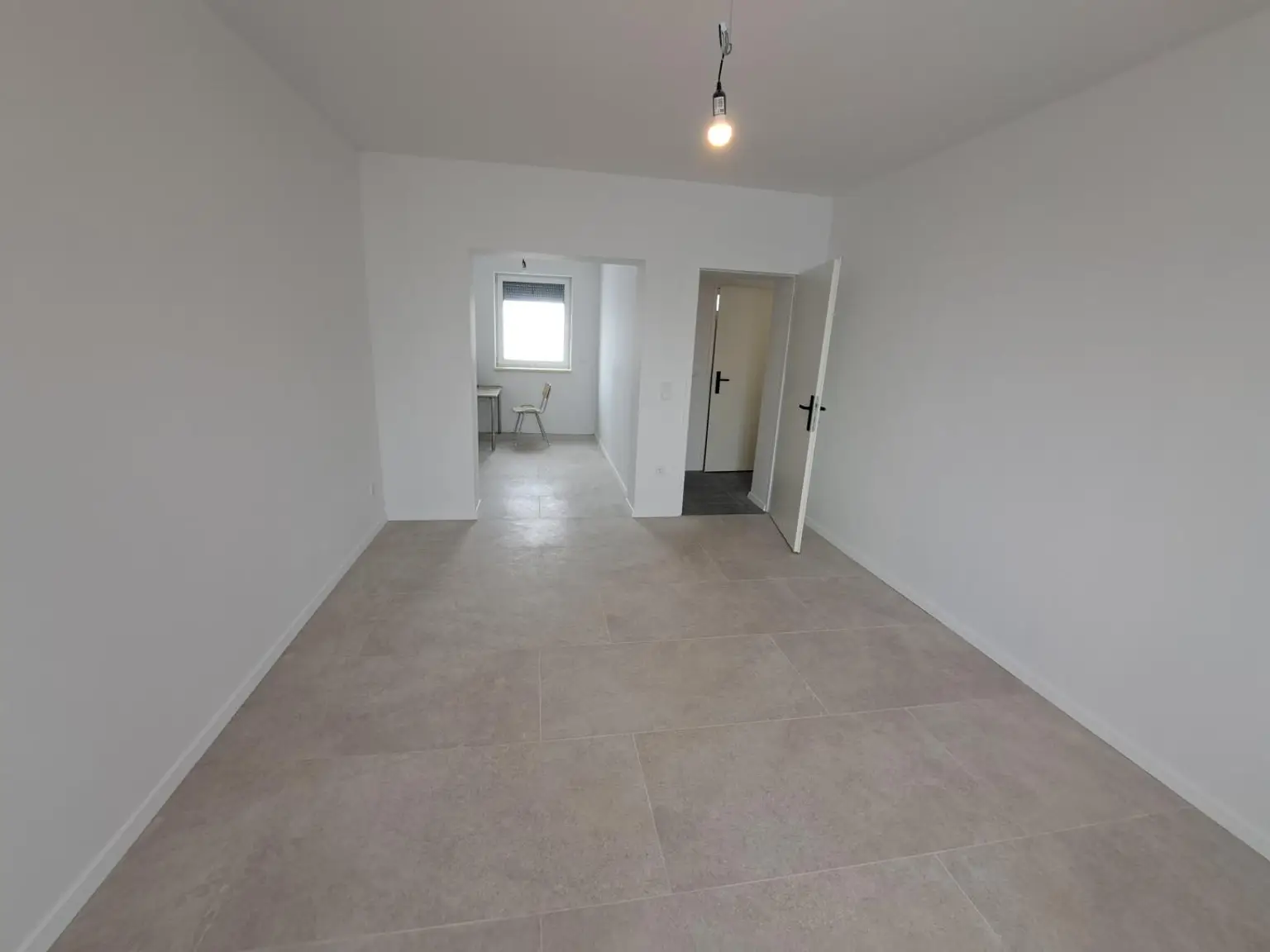 Wohnzimmer mit Küche