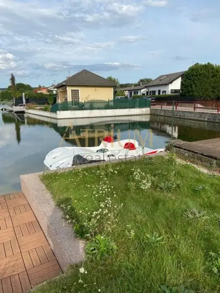 Wohnen mit Seeblick – Charmantes Haus auf Pachtgrund in 2451 Au am Leithaberge