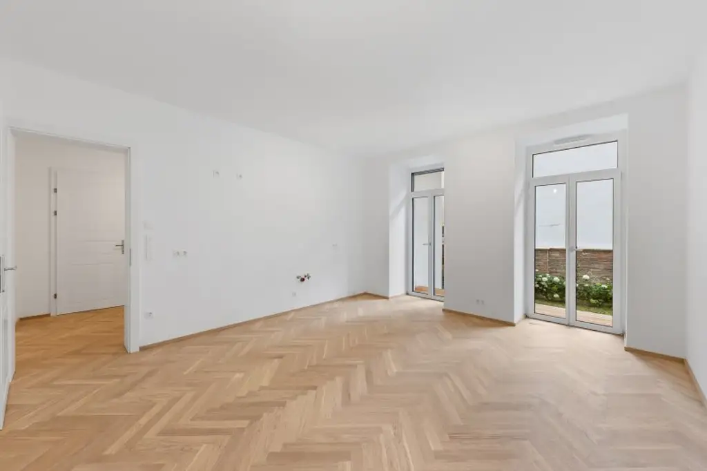 3-Zimmer-Altbaueigentumswohnung in generalsaniertem Altbau mit Terrasse und Garten